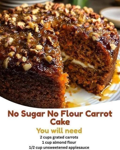 8 Secrets to Bake the Ultimate Carrot Cake 1 A double-layer frosted Carrot Cake topped with cream cheese frosting and chopped walnuts on a glass cake stand
