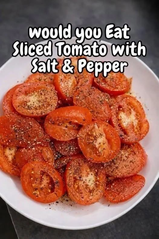 10 Best Sliced Tomato Recipes You'll Love 1 Freshly Sliced Tomato arranged on a plate seasoned with coarse sea salt and black pepper