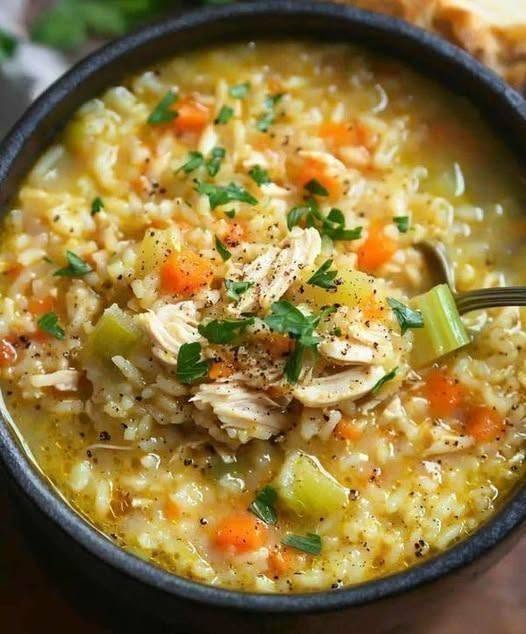 7 Delicious Reasons to Love This Creamy Chicken & Rice Soup 1 Creamy Chicken & Rice Soup with tender chicken, rice, carrots, and celery